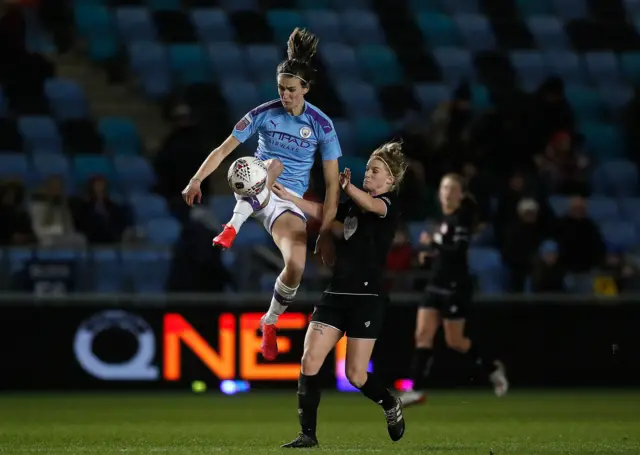 Jill Scott battles for the ball with Bristol City's Jasmine Matthews