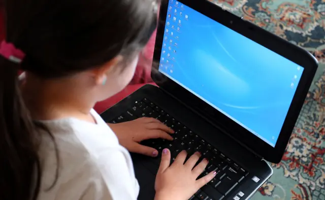 A child using a computer