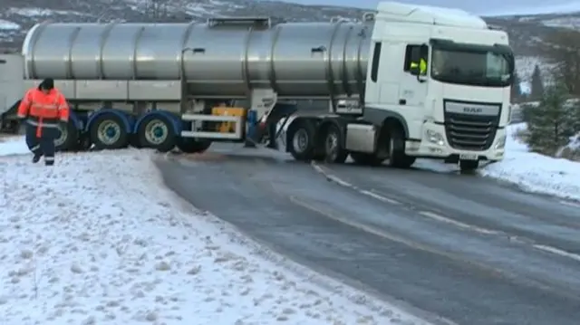 Water tanker turning on road