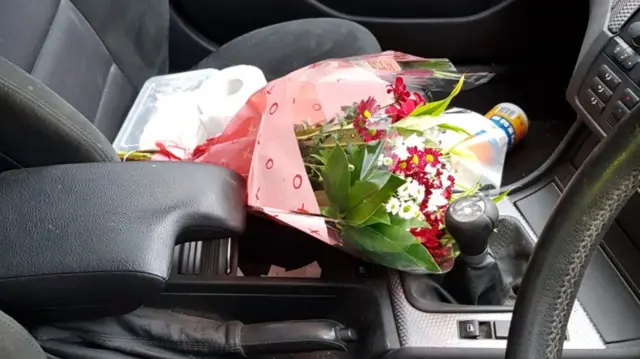 Flowers in car