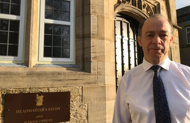 Andrew Fleck outside Sedbergh School office