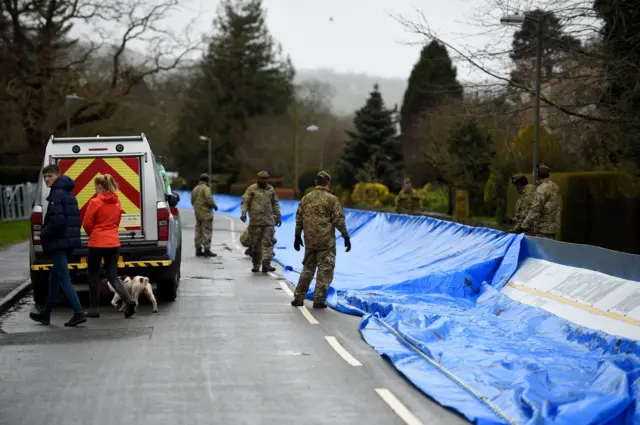 Soldiers erect flood barricades in Ilkley,