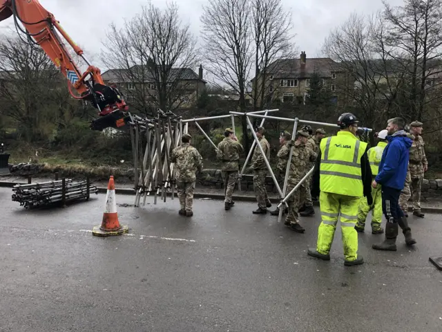 Soldiers help construct flood defences in West Yorkshire