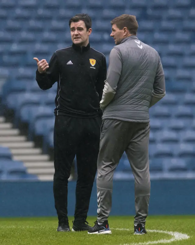 Referee Don Robertson chats with Rangers manager Steven Gerrard