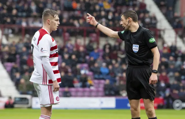 Referee Kevin Clancy gives Jamie Hamilton his marching orders