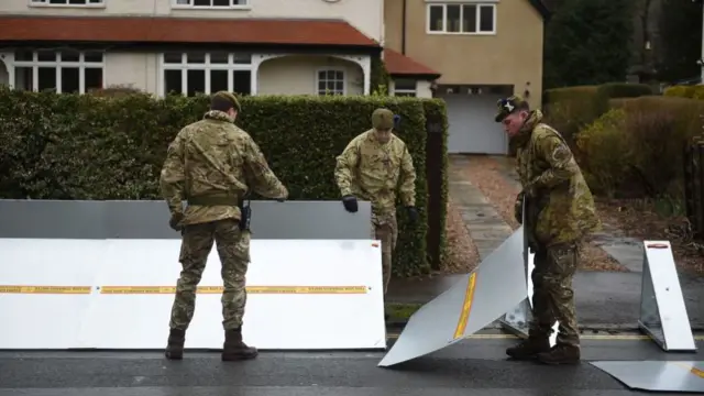 Soldiers building flood barrier in Ilkley