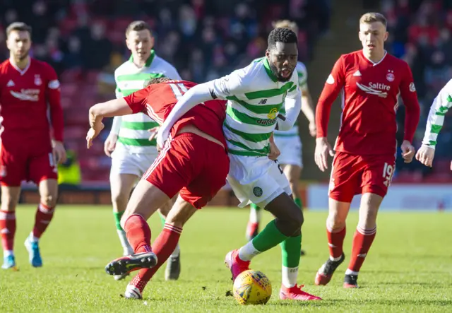 Celtic’s Odsonne Edouard and Aberdeen’s Ash Taylor tussle for possession