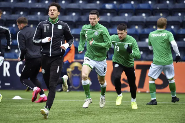 The players warming up at Rugby Park