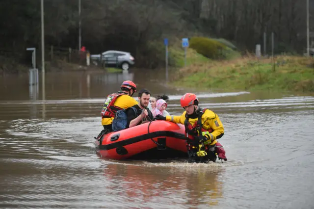 Families rescued from flooding in Nantgarw, south Wales