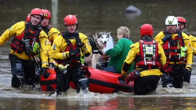 Someone being rescued during Storm Dennis