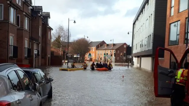 Fire crews rescuing people