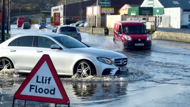 Cars navigate waters in Wales