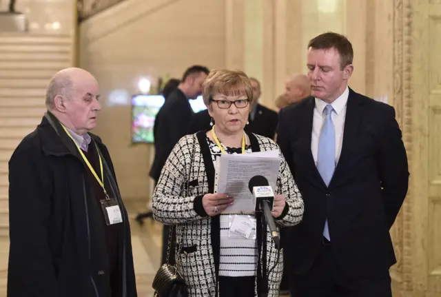 The parents of Paul Quinn at Stormont