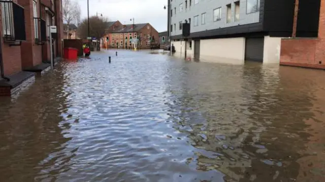 A flooded road in Shrewsbury city centre