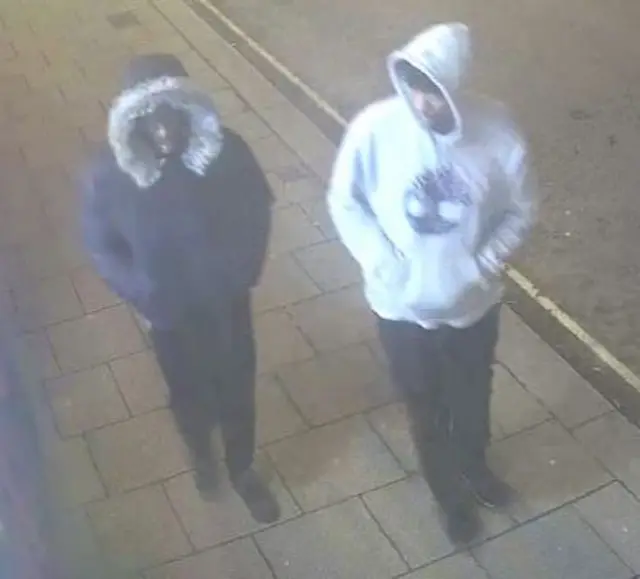 CCTV image of two men