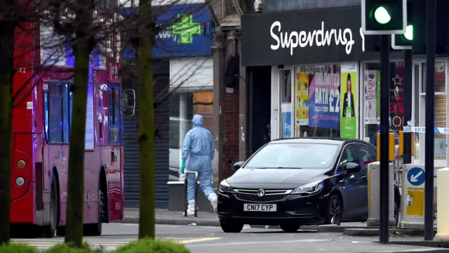 A forensic officer at the scene