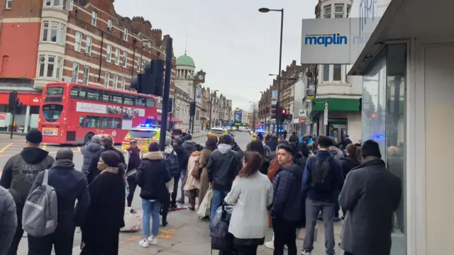People gather in street