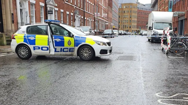 A police car at the scene