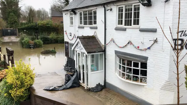 Floods outside restaurant