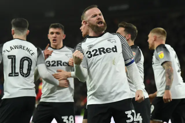 Wayne Rooney celebrates