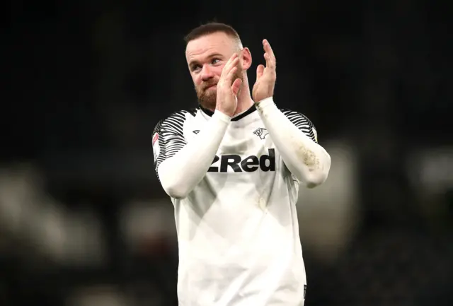 Wayne Rooney claps the fans