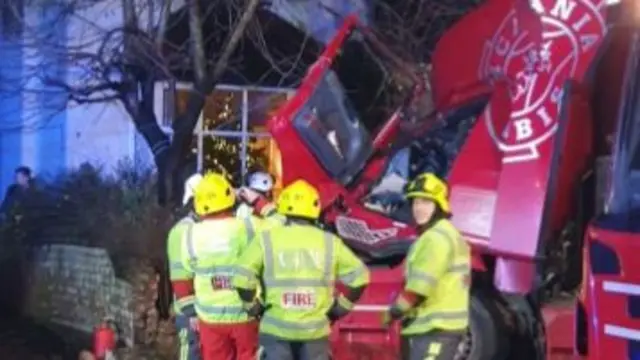 Fire crews near crashed lorry