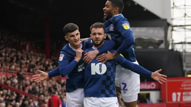 Adam Armstrong celebrates his goal against Brentford