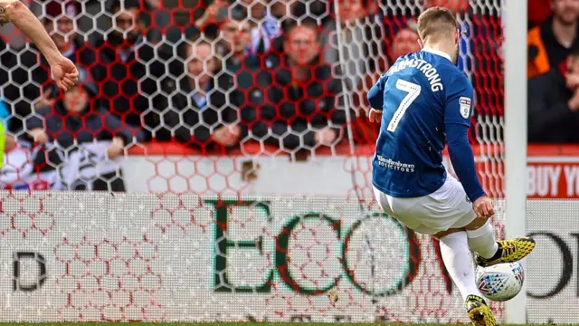 Adam Armstrong scores a penalty