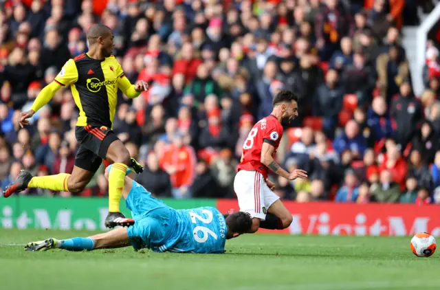 Bruno Fernandes is brought down by Ben Foster