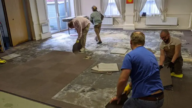 Floor tiles being lifted