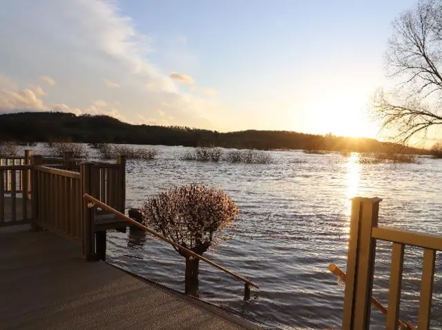 Sun setting over flooded Buildwas this evening