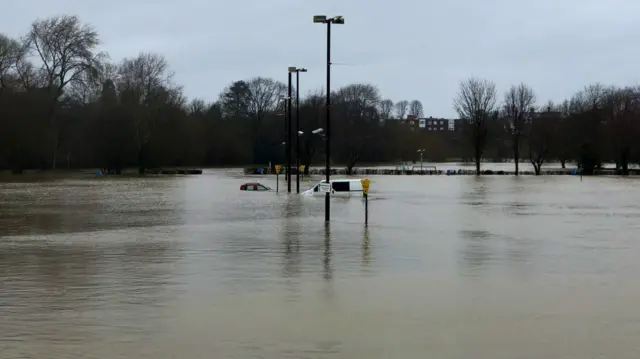 Van underwater in car park