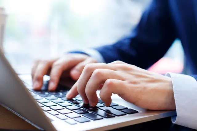 A man using a computer