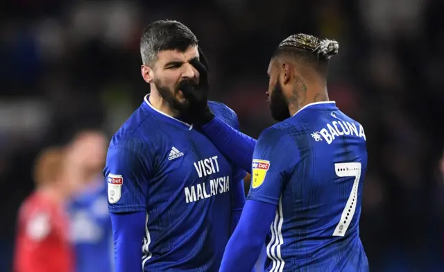 Callum Paterson and Leandro Bacuna