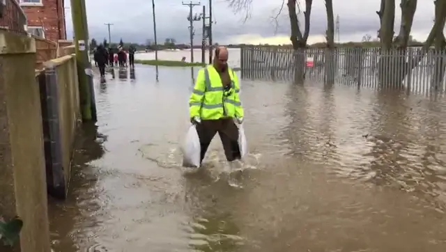 A person with sandbags