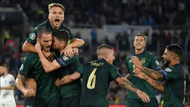 Jorginho of Italy #8 celebrates after scoring the opening goal during the UEFA Euro 2020 qualifier between Italy and Greece on October 12, 2019 in Rome, Italy