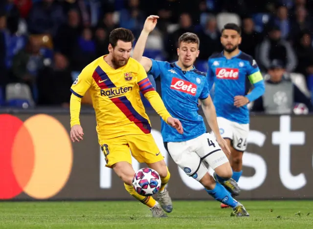 Barcelona's Lionel Messi in action with Napoli's Diego Demme