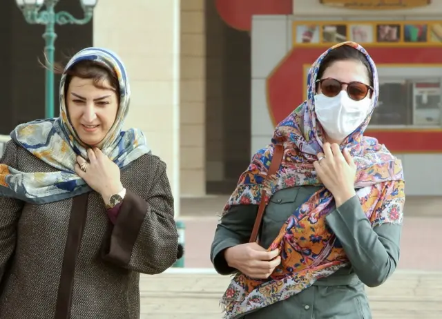 People in Iran wearing masks