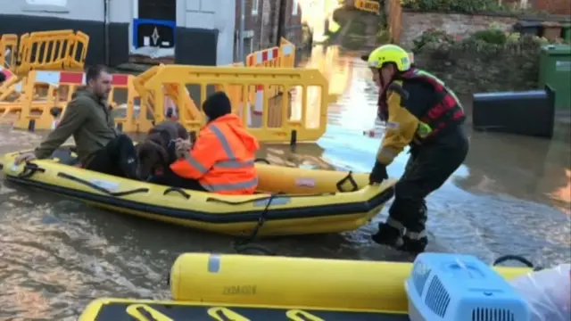 Justin being rescued with dogs