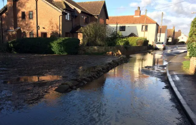 Hirst Courtney flooded road