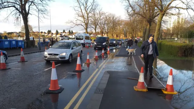 Road onto bridge starting to flood