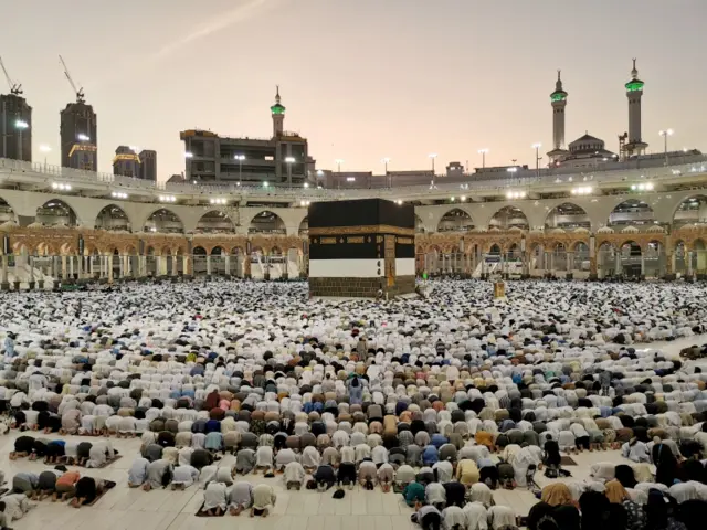 Muslims pray at the Grand Mosque during the annual Hajj pilgrimage to Mecca in 2019