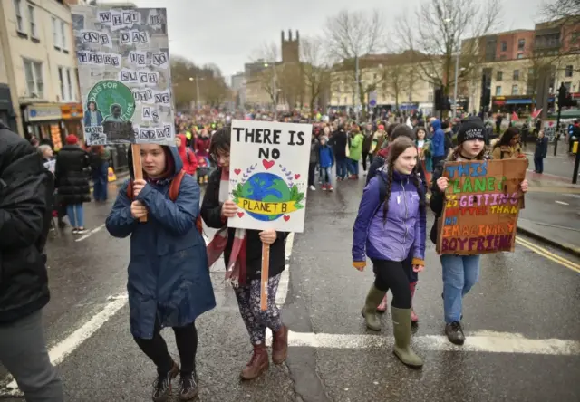 Climate strike protesters march through Bristol