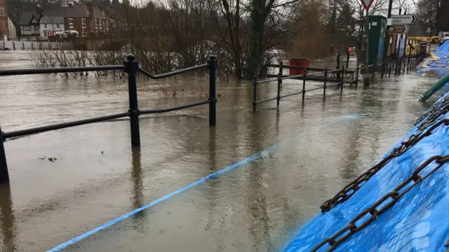 River Severn lapping against barriers