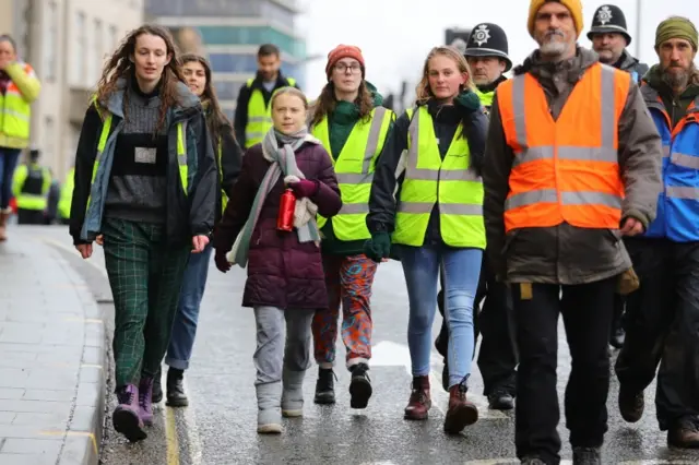 Climate strike protesters march through Bristol