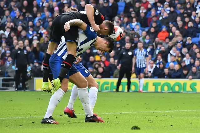 Brighton and Palace players battle for the ball