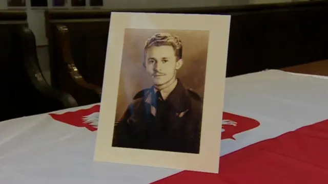 Younger Jim Auton on Polish flag