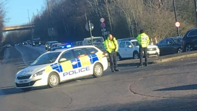 A police car at the scene