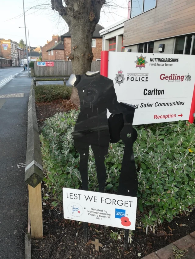 Statue of soldier without head or arm