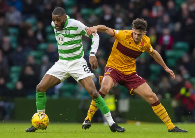 Celtic midfielder Olivier Ntcham vies for possession with Motherwell's Barry Maguire